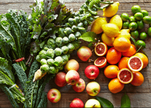 a group of fruits and vegetables on a wood surface Healthy Weight Loss Diets Scottish